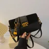 24% KORTING Designer tas 2024 Handtassen Hoge kwaliteit Franse Commuter Schouderketting voor Chinees Jaar Modieuze en veelzijdige Crossbody met enkele schouder