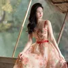 Casual klänningar gaganight kvinnor fransk stil söt kryddig tjej fragmenterad blomma hängande rem klänning 2024 sommaren high end strand semester