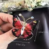 Pins broches nieuw ontworpen kleurrijke vlinderbroche voor vrouwen en meisjes romantische zoete dazzle bloem vlinderbroche broche luxe sieraden y240329