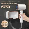 Hair Dryers New Product No Punching Wall Mounted Hair Dryer 2000W High-Power Quick Drying Hotel Bathroom Negative Ion Hair Care Hair Dryer 240329