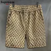 Supzoom Przyjazd Summer luźno męskiej swobodnej mody High Street Sense Sense Crisscross Shorts Men 240329
