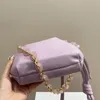 Sac de créateur Portefeuille de luxe Sac à chaîne perlée Petit sac pour femme 2024 Nouveau cordon de serrage Sac porte-bonheur Sac à bandoulière Sac à bandoulière Sac de toilette Sac de maquillage