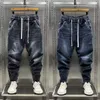 Alta qualidade novo 2024 designer de luxo casual solto cordão jeans homens comprimento total perna larga streetwear cowboy harem calças b9xB #