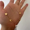 Franska triumfbåge Multi Element Love 316 Titanium Steel Necklace Pläterad med 18K utsökt ljus lyxkrage för kvinnor