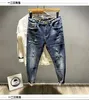 2022 Summer Blue Distraed Patch Young Men Slim Fit Elastic Ripped Streetwear Fi Korean pojkvän Designer Jeans för män T0KE#