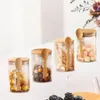 Bottiglie di stoccaggio Barattoli di vetro con coperchi di bambù e barattolo di tè con cucchiaio 4 pezzi per alimenti secchi per caramelle e biscotti
