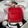 Mini zaino di moda di lusso Borsa a tracolla in vera pelle da donna Monete d'oro sul fondo Pelle di vitello rossa nera Big Space Lady Shopping Zaini da viaggio con pacchetto completo