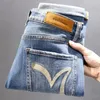 Jeans masculinos avançados sentido de design bordado para homens luz luxo cores contrastantes slim fit perna reta meados de ascensão calças elegantes