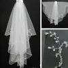 Veaux de mariage à bord perlé bon marché 2023 avec peigne à deux couches de tulle perles Veil nuptial des actions de mariage en ivoire blanc s8rz #