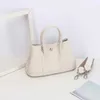 2024 Primavera Nuova Borsa da donna in vera pelle Togo Headlayer Pelle bovina Giardino Tessitura Tracolla Borsa con tracolla portatile