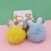 Portachiavi Simpatici Catene con pompon Accessori per gioielli Fiocco a pois Design del mouse Fluffy finto coniglio Palla di pelo Portachiavi Donna Ragazze Auto Scho Dhafh