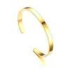 Bracelet forme C en acier inoxydable avec ouverture réglable en acier titane et bande droite gravée