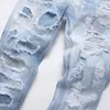 Herr jeans män kristall lappar rippade nödställda ljusblå stretch denim byxor knapp smal avsmalnande byxor