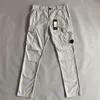 Pantalon tactique le plus récent vêtement teint Cargo un pantalon de poche d'objectif en plein air hommes pantalons livraison directe vêtements Otm4H