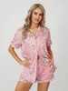 Vêtements de nuit pour femmes Femmes Summer Satin Loungewear Set Cartoon Bow Imprimer Manches courtes Hauts à revers crantés avec short de taille élastique