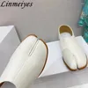 Chaussures décontractées mocassins à bout fendu femme en cuir véritable noir blanc femme confort Mules été plat pour les femmes