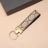 Tasarımcı Keychains Klasik Exquisit Landards Erkek Deri Araba Zinciri Kadın Moda Kalp Anahtar Yüzük Çantalar Kolye