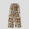 Męskie spodnie 2024 Kwiatowy druk z szerokiej nogi koronki w górę luźne swobodne spodnie męskie mody streetwear mody mostka pantalon s-5xl inderun