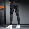 Wiosenne lato workowane dżinsy mężczyźni demin joggers spodnie mężczyźni Ubranie spodni ładunkowe sznurki szczupłe spodnie y2k streetwear dżinsy i4fj#