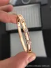 Brand Fashion busje vier blad gras caleidoscoop armband dames vergulde 18k smal wijd vervaagt geen sieraden met logo