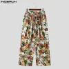 Męskie spodnie 2024 Kwiatowy druk z szerokiej nogi koronki w górę luźne swobodne spodnie męskie mody streetwear mody mostka pantalon s-5xl inderun