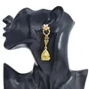 Dingle örhängen bohemisk ihålig kristallblomma india jhumka för kvinnor gyllene klockformad tofs pendell turkisk vintage