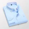 Koszulki sukienki męskiej 2024 Formalna koszula biurowe biurowe solidne guziki z długim rękawem Down-Down Kołnierz odzież 5xl 5xl