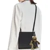 Axelväskor texturerade crossbody kvinnor 2024 mode messenger väska groddekoration fyrkantiga förpackningar designer varumärke handväska och handväskor