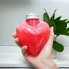 Caffettiere 10 pezzi 300 ml Bottiglie di plastica a forma di cuore per contenitori di stoccaggio di bevande Bottiglia di acqua potabile con tappi di coperchio