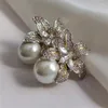 Studörhängen 9.4G Faux Pearl Lily Earring Mans-Made Light Luxury Jewelry and Accessories Copper Zircon Wild