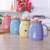 Mugs 1PC Ceramic Mug With Spoon And Lid Cute Coffee Cup Milk Cartoon Steaming Microwave Cup.