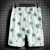 Herrspår med Hawaiian stil skjorta shorts set avslappnad passform tropiska blad tryck med elastisk