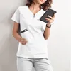 Enfermeira de saúde Túnica Mulheres Sólidos Bolso Scrub Tops Blusa de Manga Curta Beleza Sal Macacões Carer Uniformes Para Mulheres o7LB #