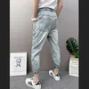 Vår- och sommaren 2021 Ny Fi Elastic midja Casual Hip Hop Spirit Guy Ripped Jeans Korean Slim Montering Ankle Length Pants N8MJ#
