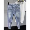 Jeans da uomo Nuova Primavera / Estate Moda coreana Uomo Jeans di lusso Tuta Elastico Stretch Articoli Lavaggio Abbigliamento Borsa a cono Pantaloni da joggingL2403