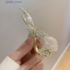 Grampos de cabelo nova moda pena garras de cabelo para mulheres sapo fivela graça pérola strass hairpin acessórios para menina banana torção clipes tiara y240329