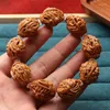 Strand Olive Core-Carved Hollow-Out Kowloon Fortune Armband Nuclear Carving God of Wealth Maitreya handhållen