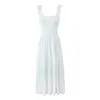 Vestido de designer escavado suspender vestido branco para mulheres primavera e verão francês seaside férias saia longa 240329