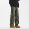 Calças masculinas primavera e outono cor sólida solta cintura alta elástica perna larga bolsos com zíper moda casual calças de rua