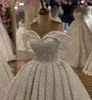 Luxury Pearls Ball Suknia ślubna Suknia ślubna z ramion cekiny koronkowe sukienki ślubne sukienki ślubne szata de Mariee Ruffles Dubai Arabska panna młoda sukienka