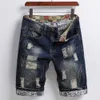 Short en jean à ourlet à carreaux Short en denim rétro avec trous déchirés Patch Design pour hommes Short de rue à jambe droite à taille moyenne W1Aq #