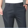 Pantalones para hombres Moda Color sólido Bolsillos con cremallera Pantalones de negocios Ropa 2024 Primavera Verano Suelto Cintura alta Casual