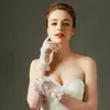 Eleganckie koronki z kości słoniowej krótkie damskie rękawiczki ślubne Cosplay Party Gloves Wedding Acories z kokardą długość nadgarstka Rękawiczki ślubne V0MD#