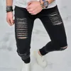 nuovi uomini alla moda jeans skinny strappati High street stile hip hop maschile fori slim matita solida pantaloni in denim pantaloni F7vq #