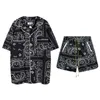 23S trendy RHUDE ethnic totem short sleeved shirt set for men and women high street shorts shirt