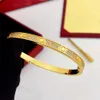 Designer armband 18k guld par hög kvalitet armband män kvinnor födelsedag gåva mödrar dag med skruvmejsel presentprydnader grossisttillbehör chirstmas