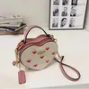 Classic Logo Women's Bag Cute Heart-Moving Striped Messenger Bags New Presbyopic Love Box Women's Bag wangwang898