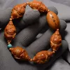 Strand Olive Core Tyst Zhiyuan Armband Kärnhuggning Maitreya handhållna Buddha-pärlor