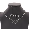 Bijoux de vente chaude en Europe et en Amérique, boucles d'oreilles collier en forme de coeur à la mode et simples, ensemble deux pièces, accessoires de mariée, ensemble de bijoux en gros