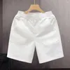 Shorts pour hommes Poches renforcées Coutures Été Décontracté Taille moyenne Ceinture élastique Plage Couleur unie Droite pour hommes